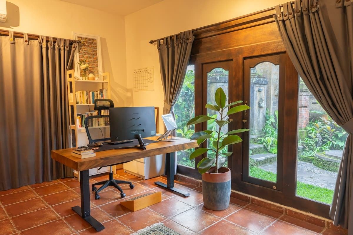 Workspace with a standing desk and monitor
